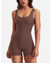 Combinaison dos nu — silhouette complète, tissu stretch